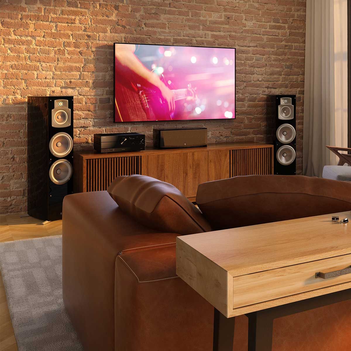 Yamaha Aventage RX-A2A A/V Home Theater Receiver, Black, on a media console beside a center channel speaker and between two tower speakers, beneath a television