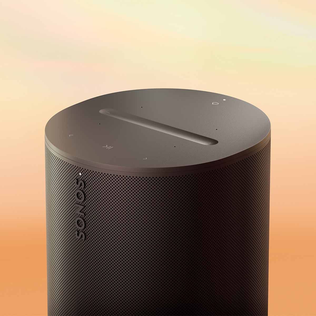 Sonos Era 100 Smart Speaker - Black - angled right top view on tie-die background