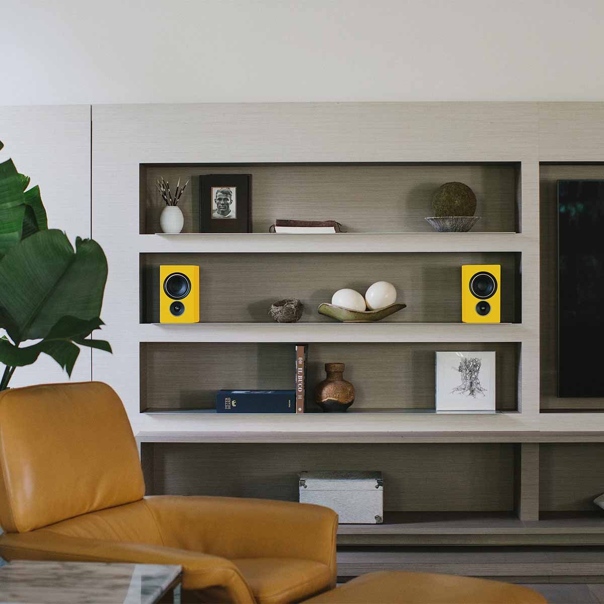 PSB Alpha iQ Streaming Powered Speakers - yellow pair - lifestyle image