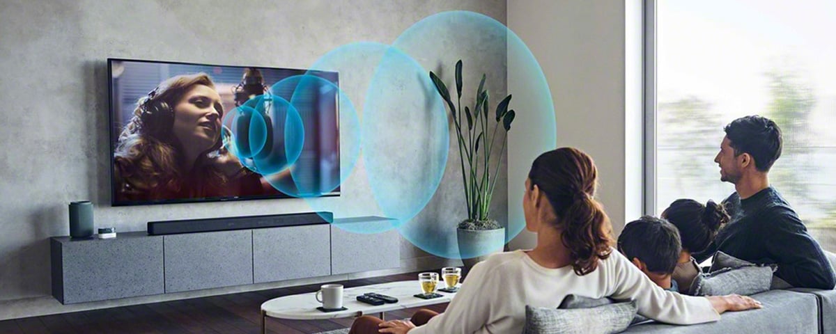 Family watching TV with illustrated sound waves come from the TV