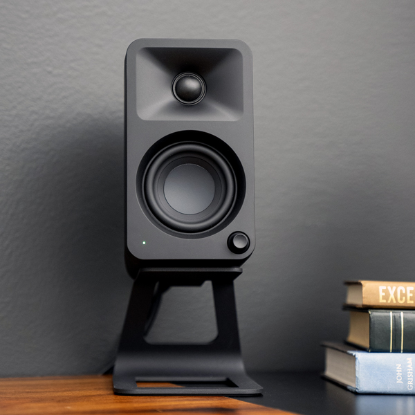 Front view of Kanto ORA Desktop Speaker on a stand
