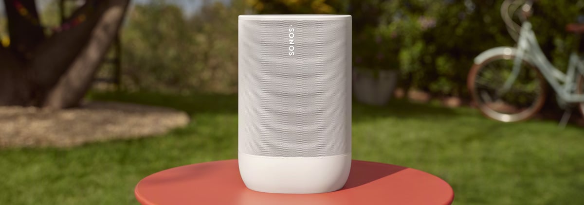 Sonos Roam 2 in white on a red stool outside