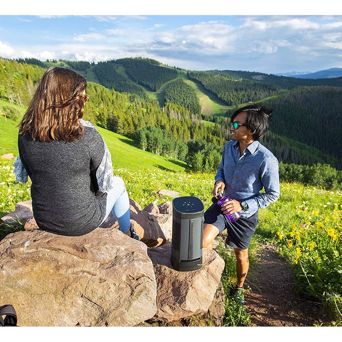 Wide-angle view of SoundCast VG5 Bluetooth Loudspeaker on a hiking trip in the mountains.