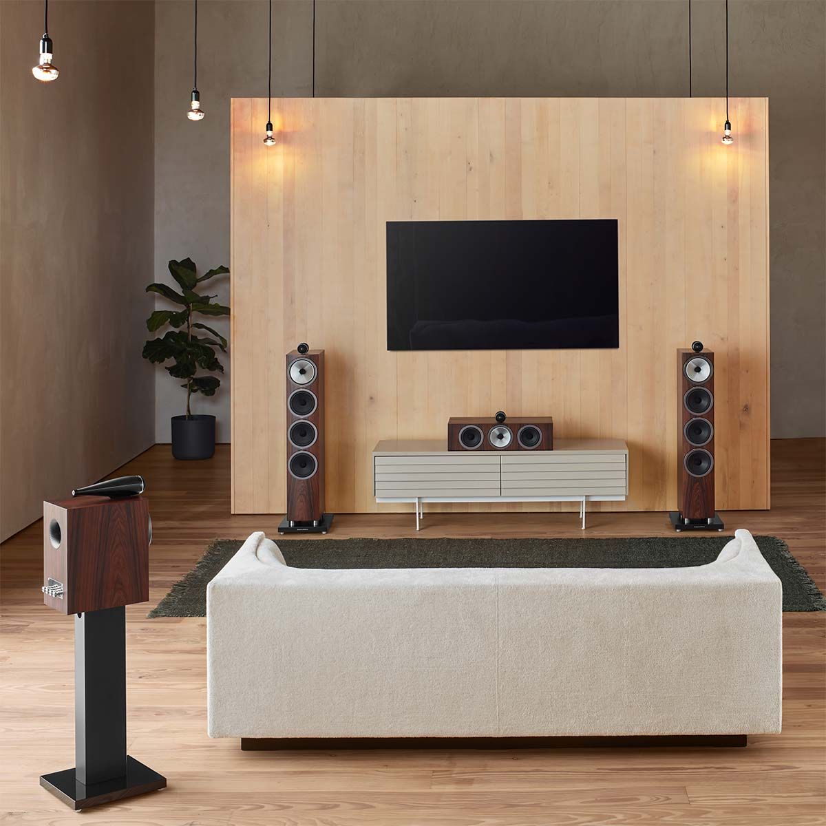 Bowers & Wilkins 702 S3 3-Way Floorstanding Loudspeaker in mocha shown in living room media room with center, surrounds, and tv