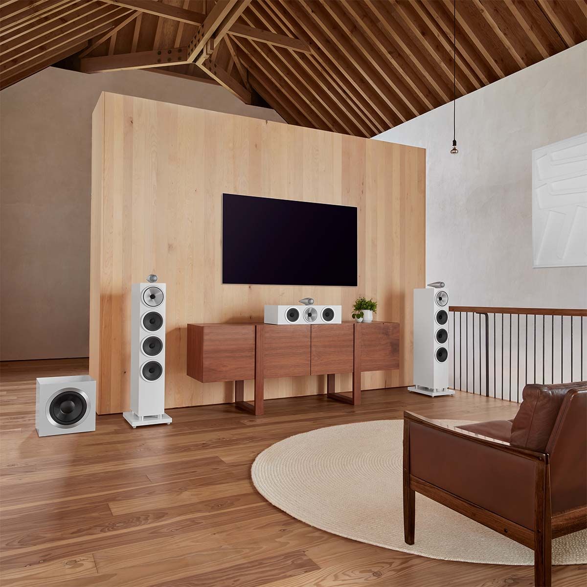 Bowers & Wilkins 702 S3 3-Way Floorstanding Loudspeaker in home theater setup with center, sub & tv