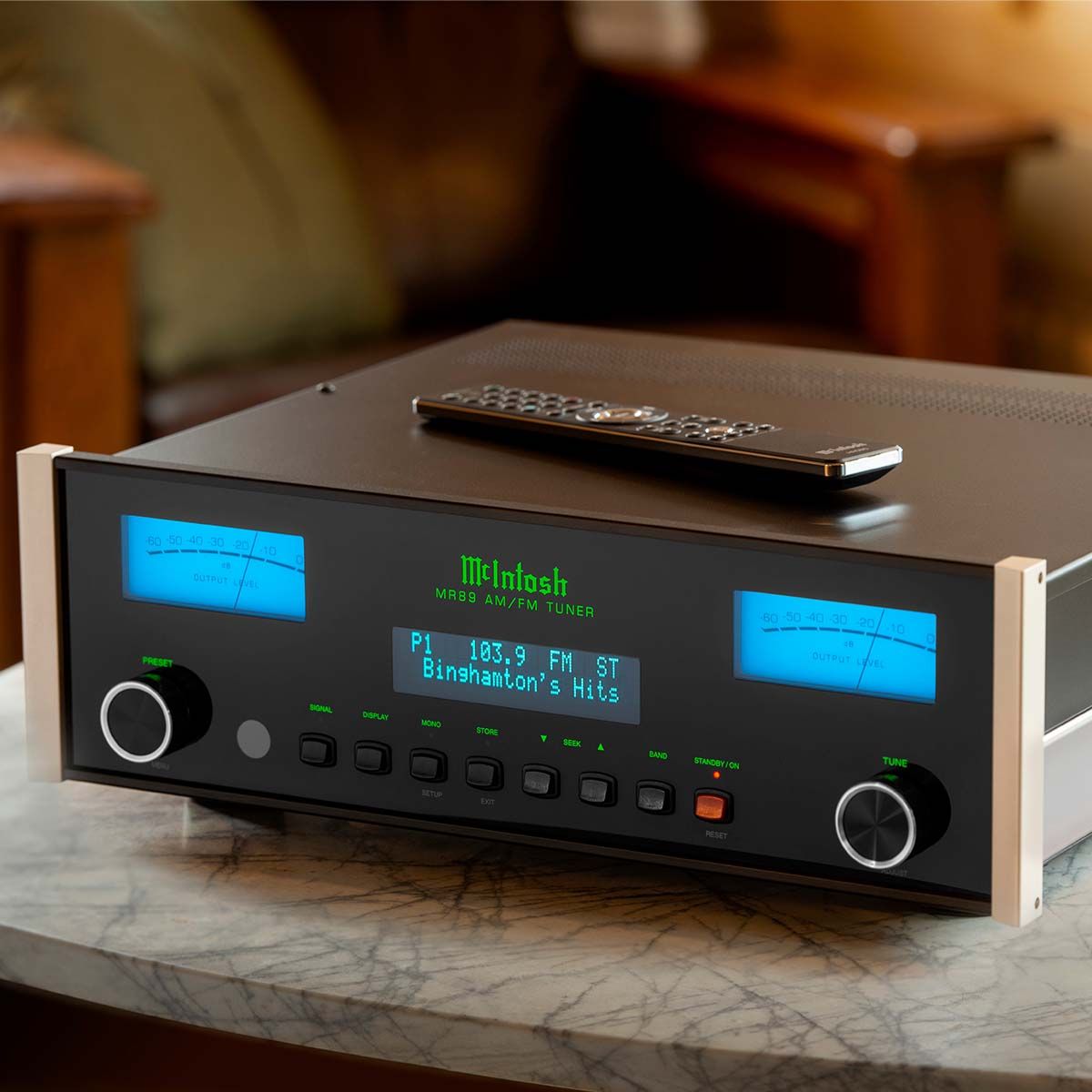 McIntosh MR89 AM/FM Tuner - on table with remote control