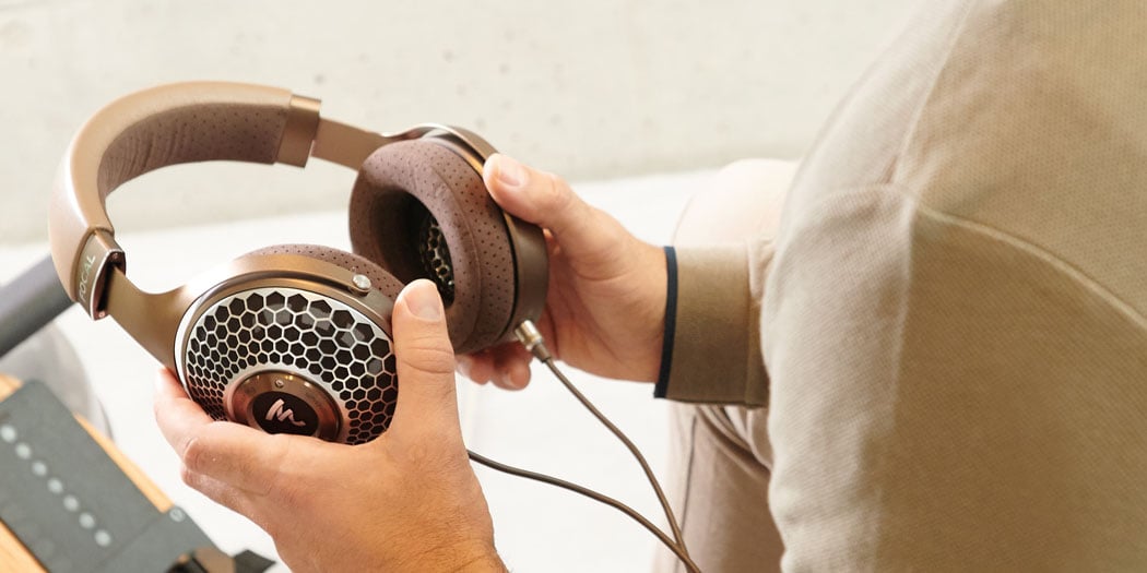 Focal Clear Mg Headphones in hand