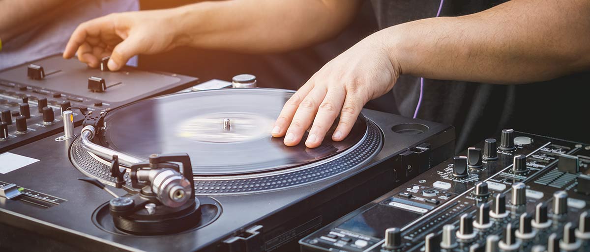 DJ scratching on a turntable
