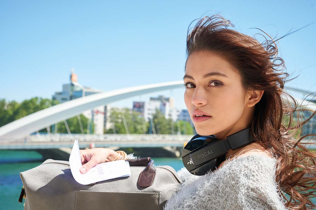 Focal Listen Wireless Headphones around female's neck 