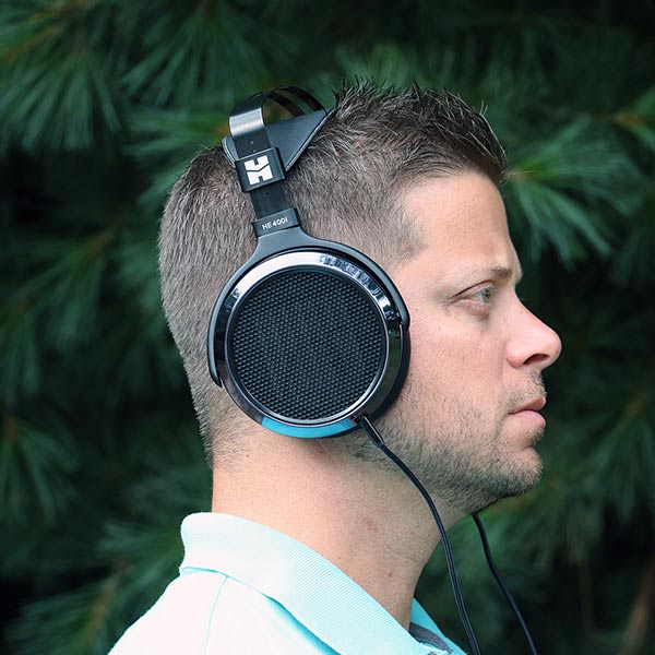 A male model wearing Over-Ear Headphones