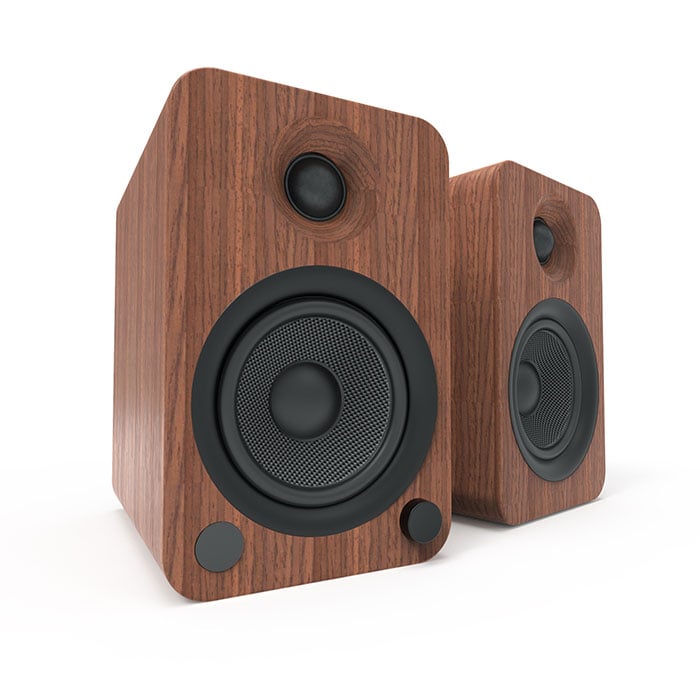 Front view of a pair of Kantu YU4 powered speakers with walnut finish.