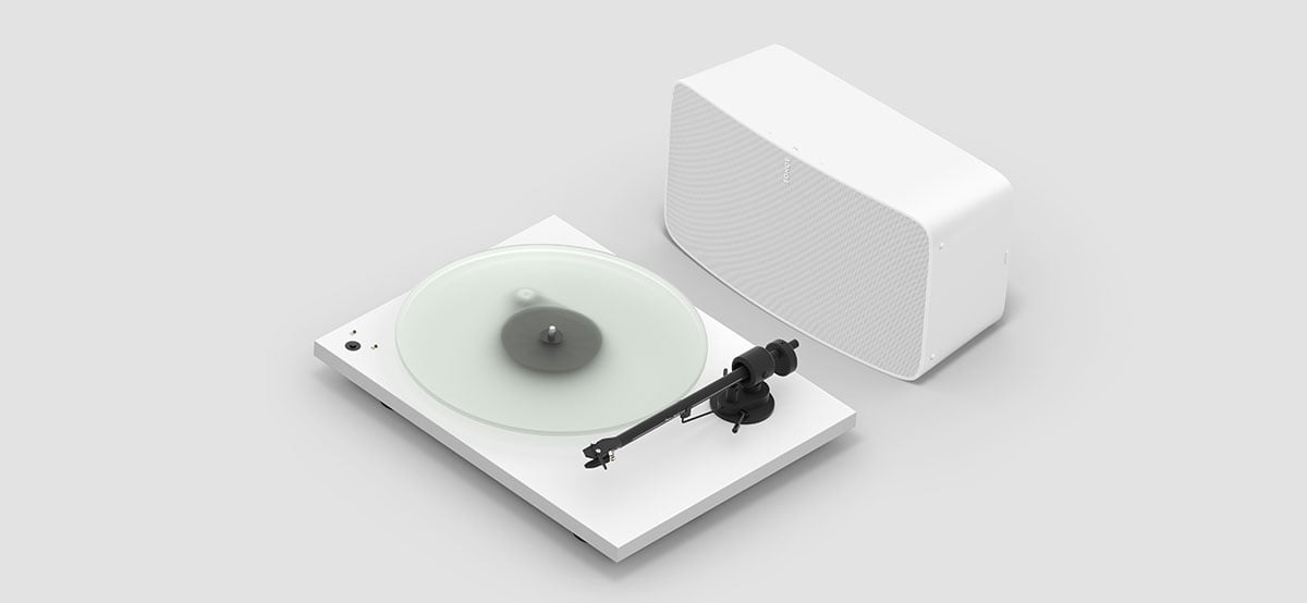 Sonos Five connected to a white turntable.