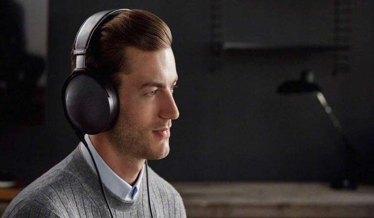 male wearing sony mdr z1r headphones