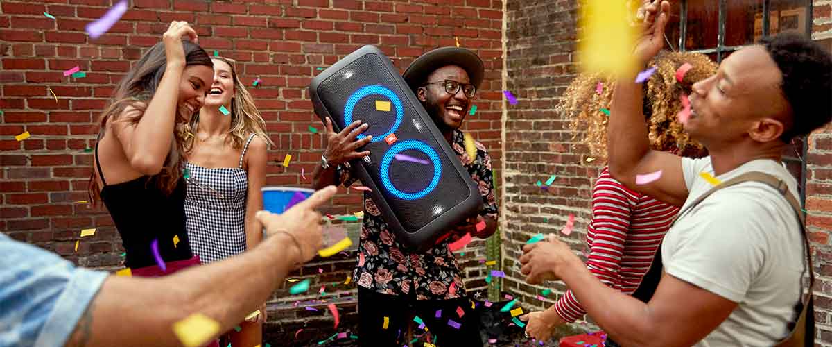 JBL PartyBox 300 Portable Bluetooth Speaker being used at an outdoor party