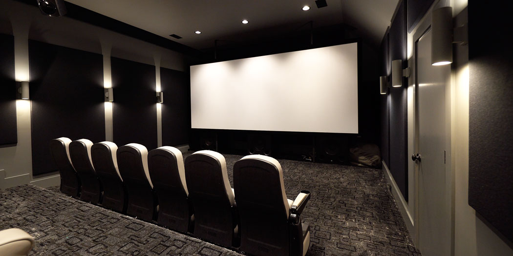 Home Theater Screen Front with chairs in front of theater.