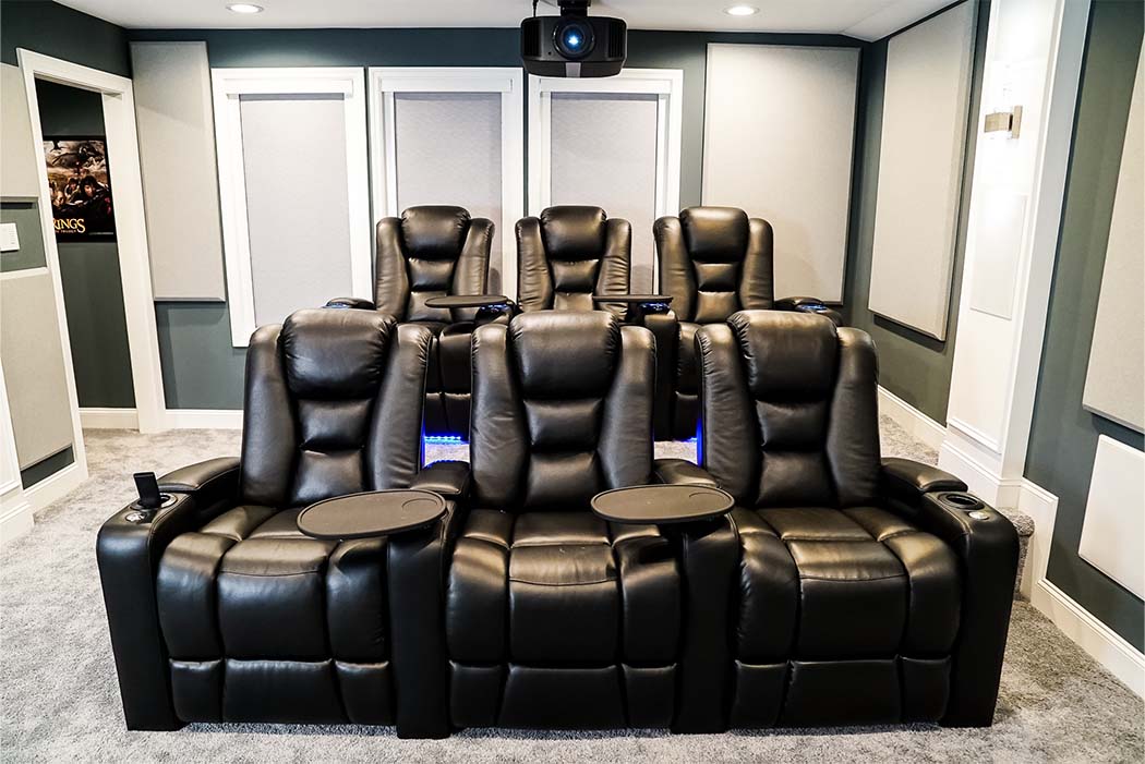Two rows of Audio Advice Revolution home theater chairs