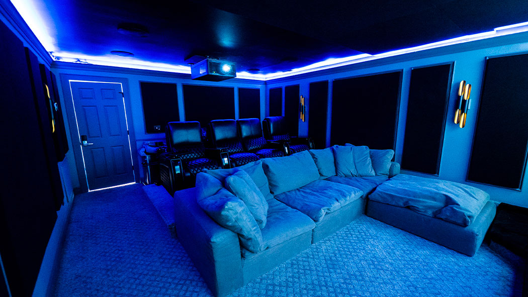 Home theater with theater seating and lounge couch