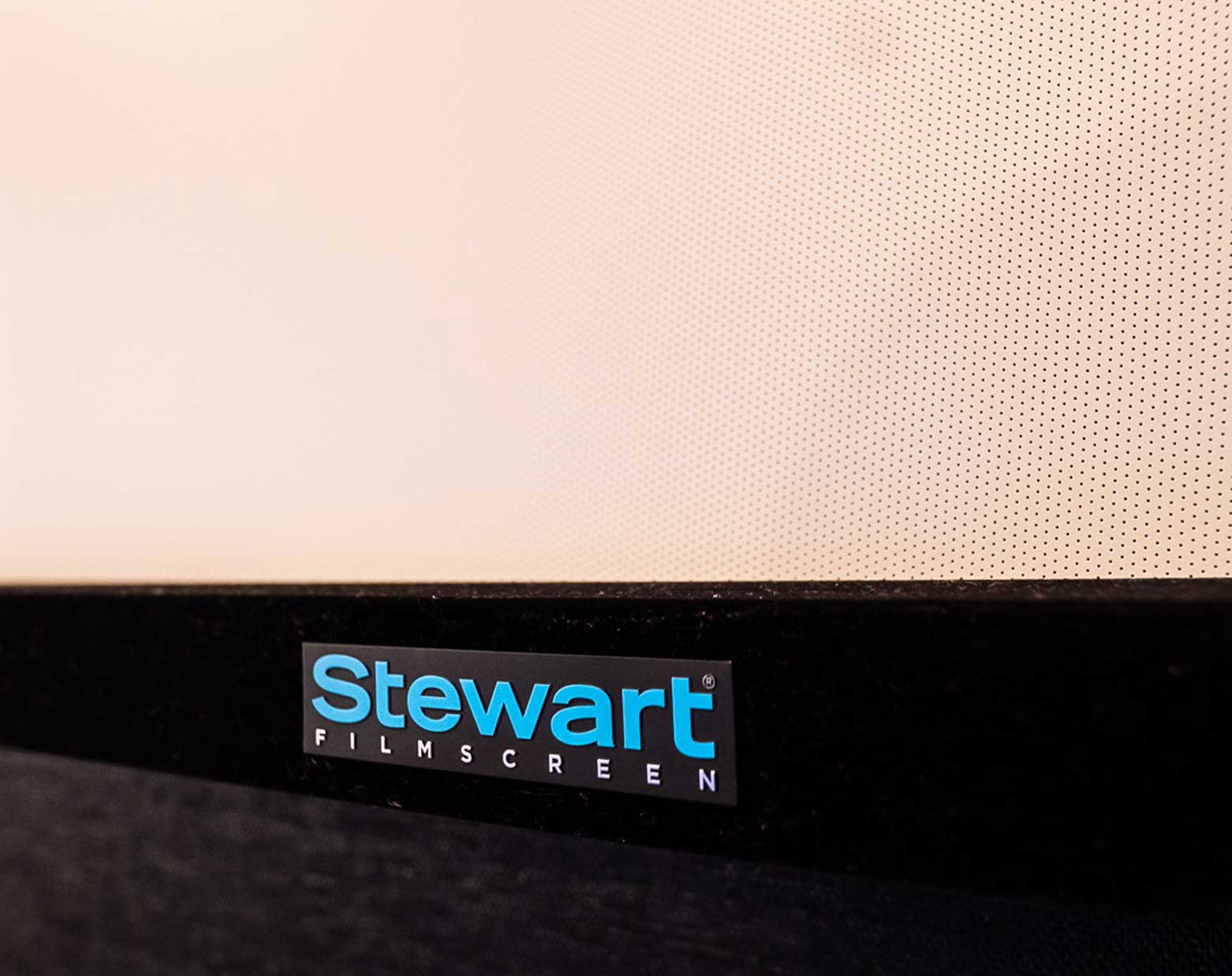 Photo of Stewart Filmscreen Wallscreen Deluxe showing logo