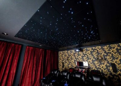 star ceiling and red curtains in home theater