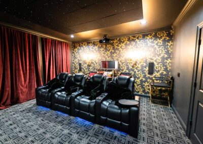 5.2.2 home theater with a row of 4 Audio Advice Revolution chairs