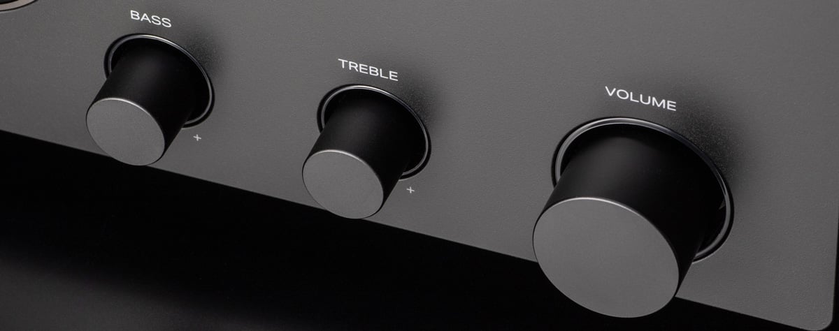 Close up of bass, treble and volume knobs on Marantz Stereo70s in black
