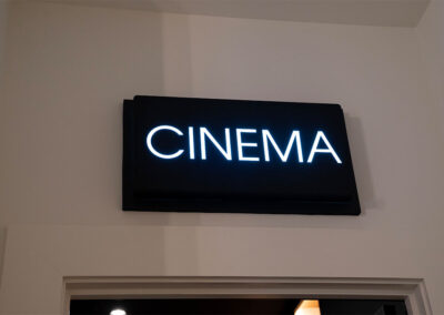 Neon "Cinema" sign from home theater