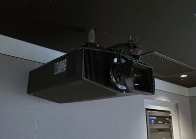 Home theater projector mounted to ceiling